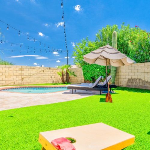 Enjoy a game of corn hole by the pool