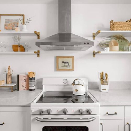 Great backyard with a pool, fire pit, and grill. The decor was chic and tasteful.