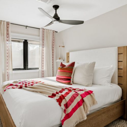 Second bedroom with a king bed and cozy linens