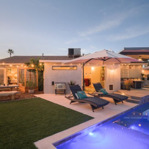 Magical evenings await with ambient mood lighting and twinkling string lights throughout the backyard.