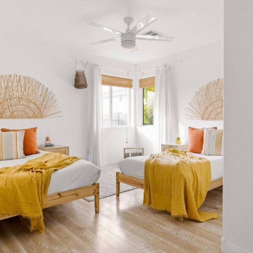 Bedroom 3 featuring two twin beds