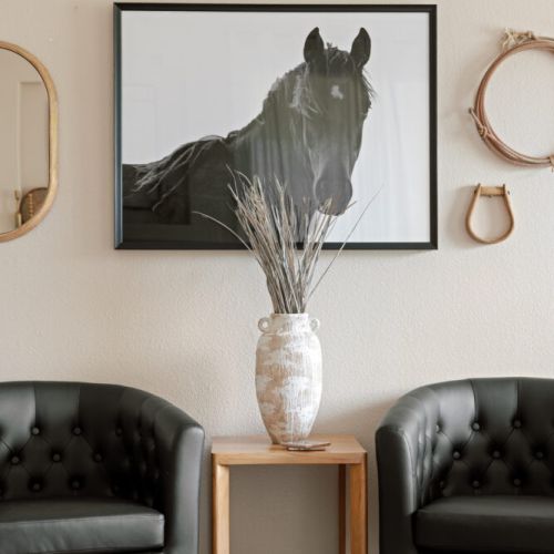 Subtle equestrian details add sophistication and timeless character