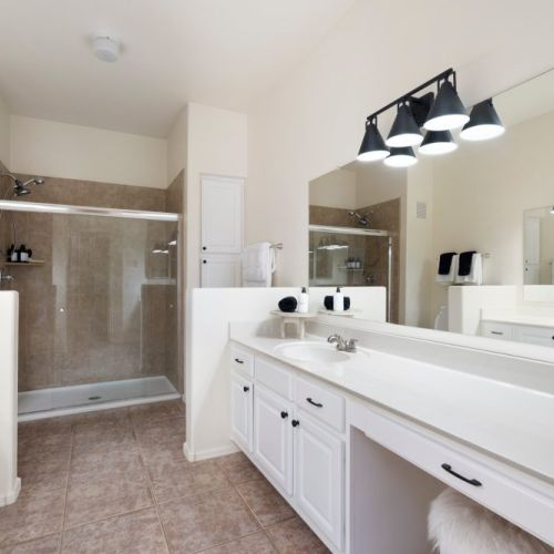 Master bathroom with 2 sinks and walk in shower.