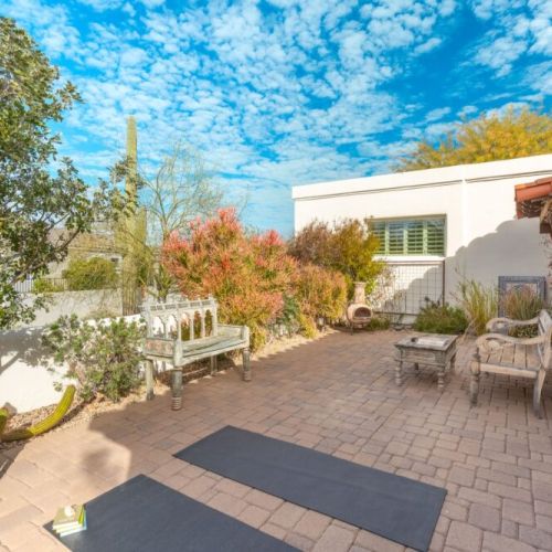 Experience peaceful mornings on the private patio off the secondary bedroom