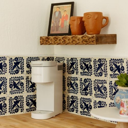 Our cozy kitchenette with a white Keurig coffee maker