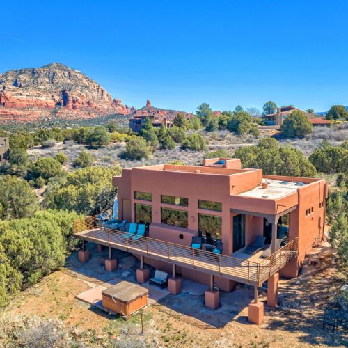 Private hot tub and wrap around balcony for stargazing and relaxing after a day of exploring.  The Private Villa.