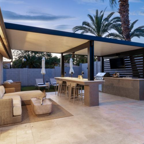 Plenty of outdoor seating- loungers, couches, or bar stools