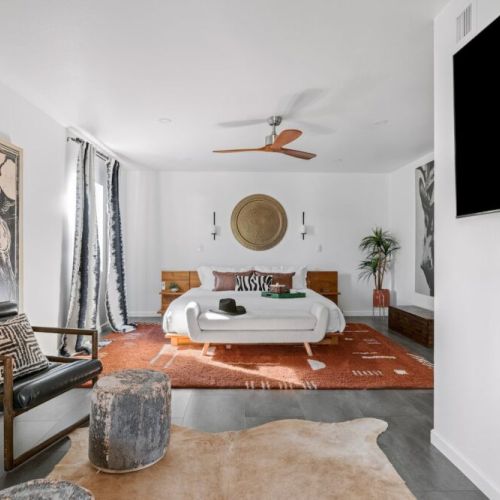 One of three bedrooms with a king bed and all the desert vibes you can soak in