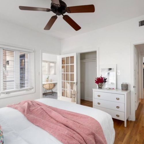 Secondary bedroom with queen bed and luxury linens