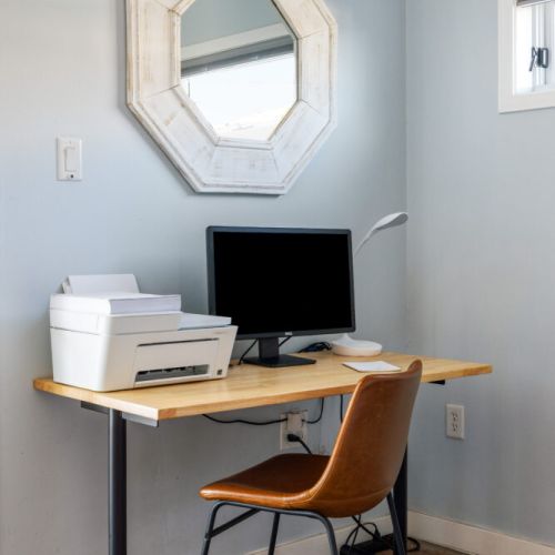 Work from paradise! Dedicated workspace with 500mbps WiFi, printer, and monitor included.