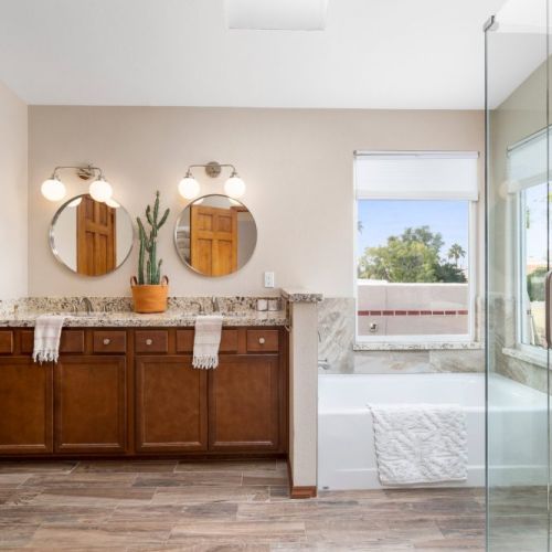 Master bathroom with separate tub and shower
