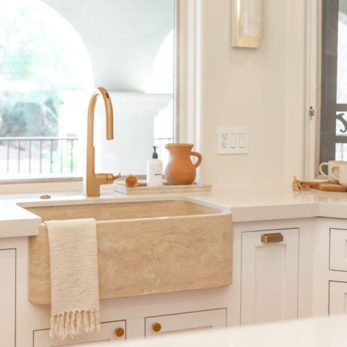 "The kitchen was fully stocked with everything we needed, and the outdoor areas were incredible — multiple dining spots, comfortable loungers, a hot tub, and a pool with stunning views of the desert landscape."