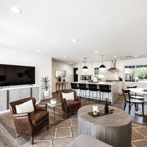 Open concept space; perfect for gatherings.  60" LED Smart TV