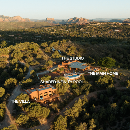Arial view showcasing the studio, the main home, and the villa.