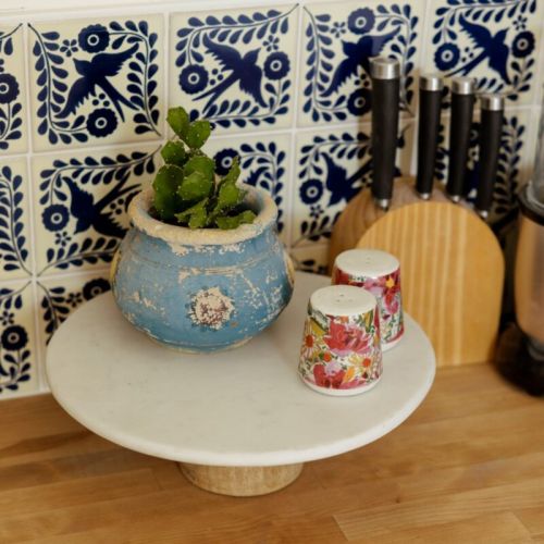 Charming kitchen details that bring color and character to your stay, from vibrant tiles to rustic pottery and floral accents, every corner of this bungalow tells a story.