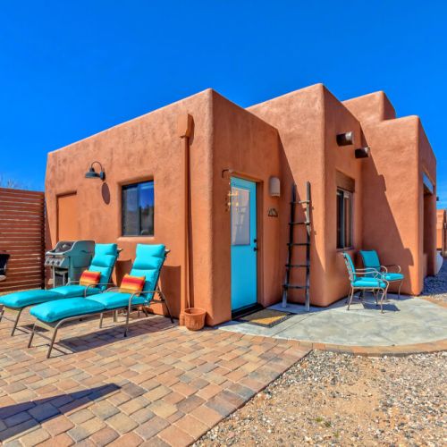 Dedicated space = private hot tub, sun chairs and grill