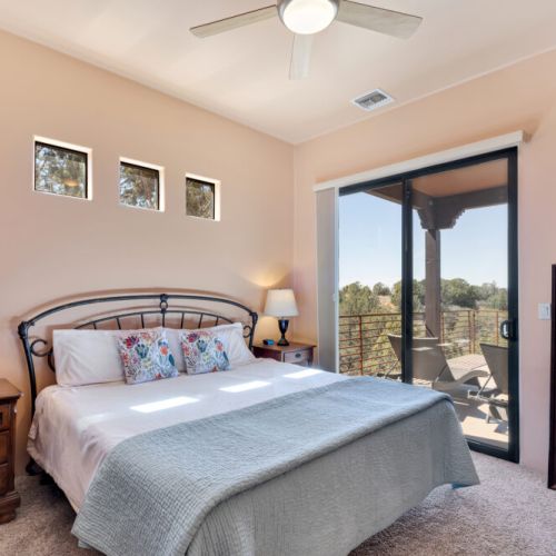 King bed with views and private patio access