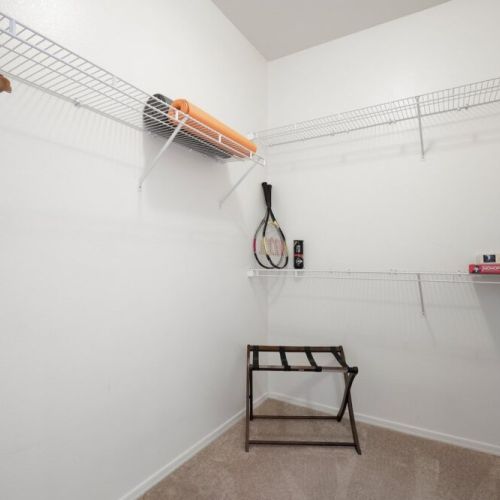 Large Master walk in closet, yoga mats, and tennis rackets to get your vacay off on the right foot.