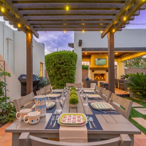 Gather your friends, family or team for dinner on the back patio under the lighted pergola.