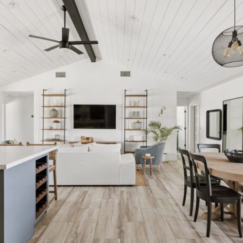 View of the open-plan living space with tv and plenty of seating