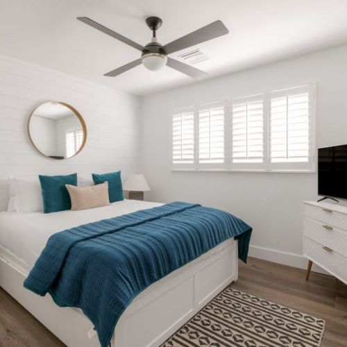 Queen bed with trundle and TV