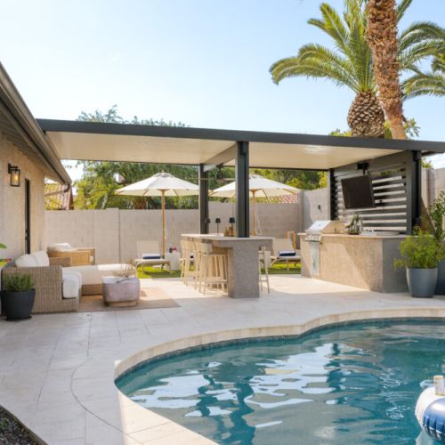 Gorgeous backyard, with plenty of options for shade or sun