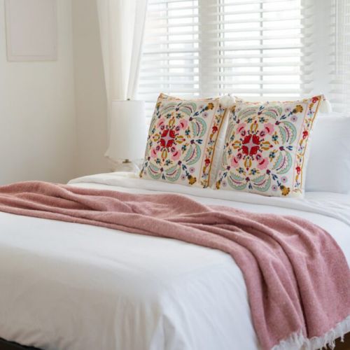 2nd bedroom with king bed, dresser and luxury linens