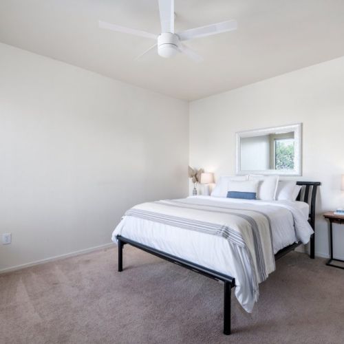 3rd bedroom with queen sized bed and large closet.