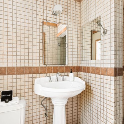 Immaculate tilework in this full bath