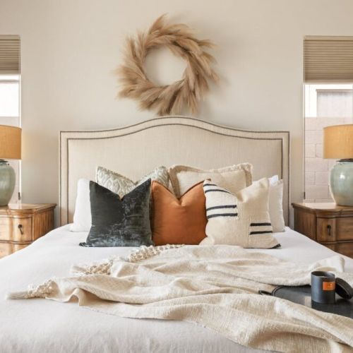 Master bedroom suite with king bed and luxurious bedding