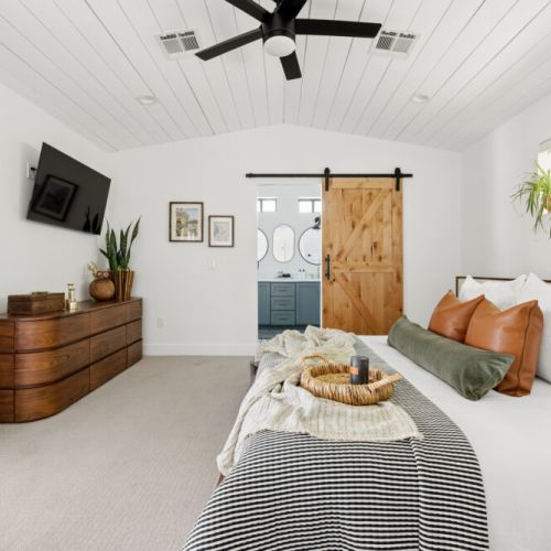 Master with king bed, tv, and attached bath