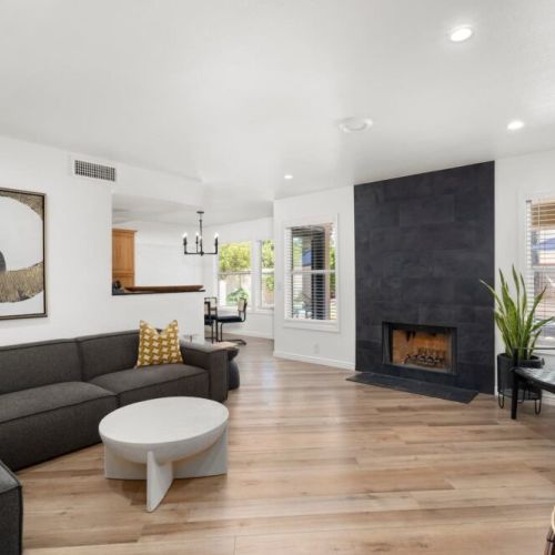 Large family room with fireplace and smart TV