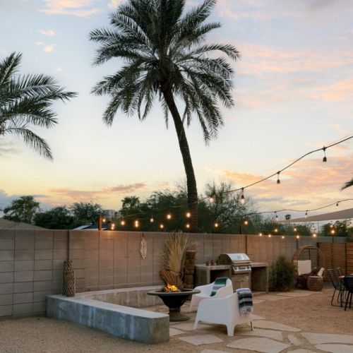 Outdoor space for entertainment, firepit, dining area, built in BBQ