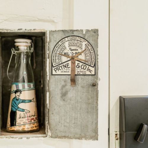 Enjoy the historic touches of our home including this original milk door.
