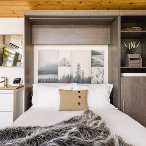 Private casita with queen bed, luxury linens, and smart TV.