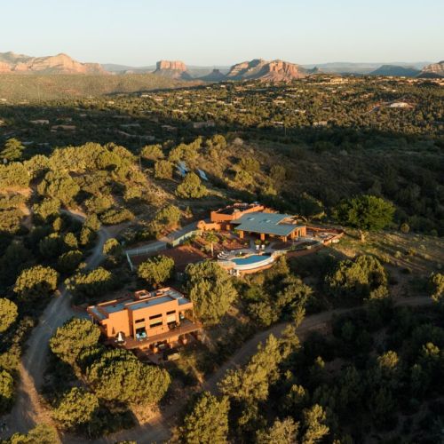 Ariel View of the Villa (on left) and the main home with the shared infinity pool.