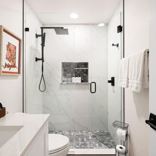 Second master bathroom with walk-in shower and eco-friendly toiletries