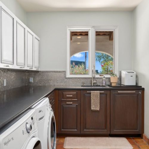 Laundry room with extra dishwasher and ice maker