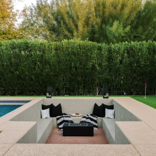 In-ground lounging space with firepit