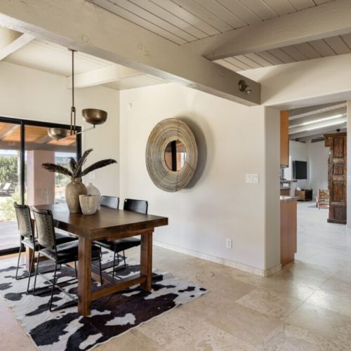 Dining area that can extend to accommodate larger groups.